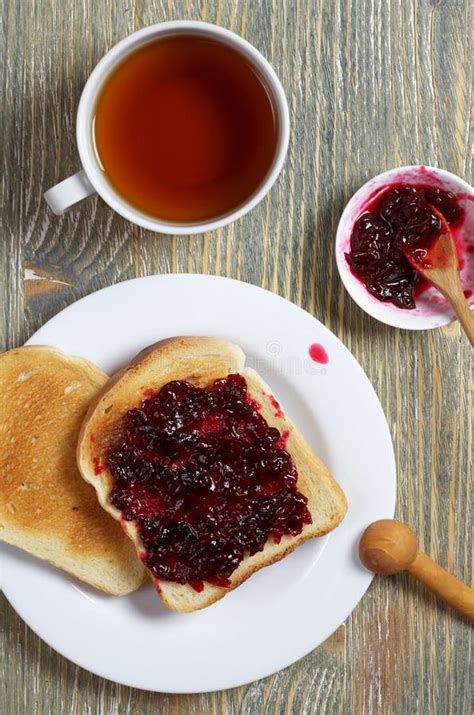 Toasted Bread with Jam and Tea Stock Image - Image of beverage, snack: 139192591