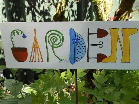 Whimsical, hand-painted sign for your garden or greenhouse! The word "garden" is spelled out ...