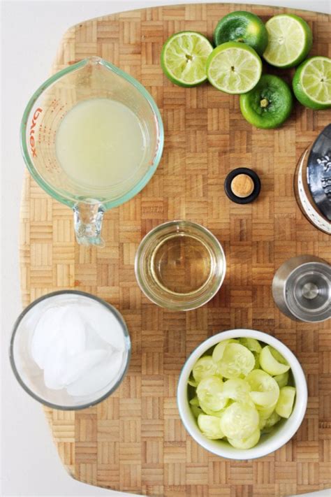 limes, water and other ingredients on a cutting board