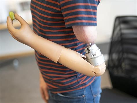 Mind-controlled prosthetic arm can now ‘feel’ objects