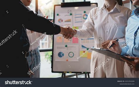 Business People Shaking Hands During Meeting Stock Photo 2231763209 | Shutterstock