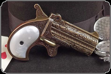 Non - firing replica pistol - Derringer - gold color