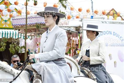 Pretty Amazons Wearing Traditional Andalusian Uniforms Fair Of Seville ...