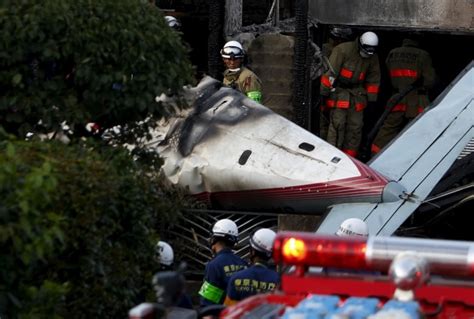 Tokyo plane crash kills 3, including woman on the ground | CBC News