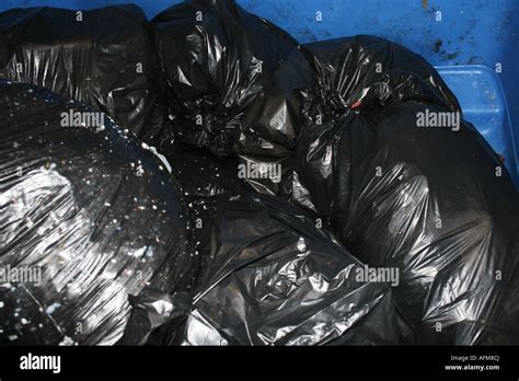 black bin bags Stock Photo - Alamy