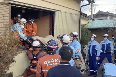 Survivors are found in homes smashed by Japan quake that killed 94 ...