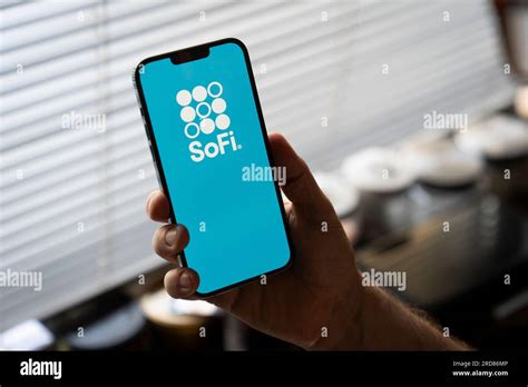 The SoFi bank logo is seen on a mobile device screen in this ...