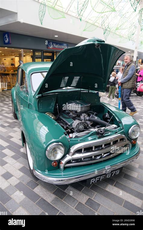 Woking, England - 24 September 2023: British classic Mini Morris car with engine hood at The ...