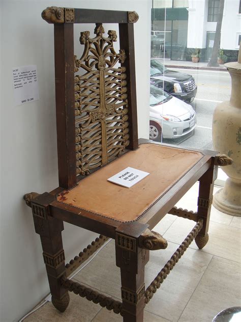 Debbie Reynolds Auction - leather-insert carved wood table… | Flickr