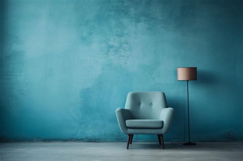 Premium Photo | 3d rendered Blue chair against blue wall in living room interior with copy space