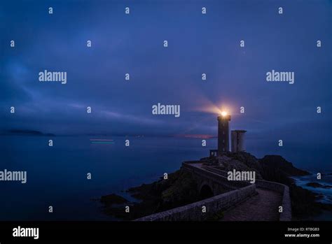 Petit minou lighthouse at night with light beam shining Stock Photo - Alamy