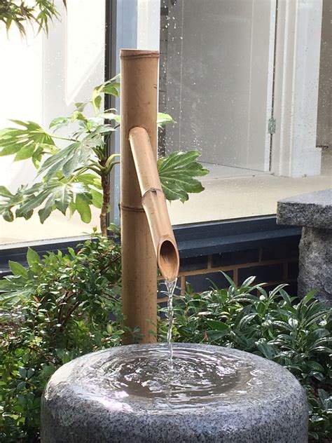 Traditional water feature | Bamboo water fountain, Small japanese ...