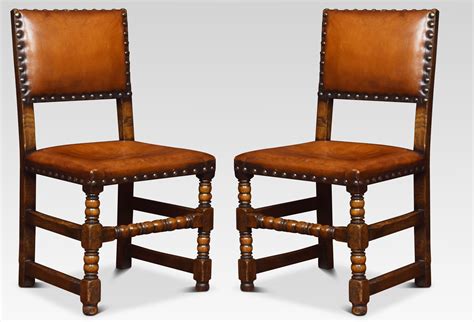 Eight leather upholstered oak dining chairs – Shacklady's Antiques