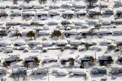 Heavy Snow Keeps Falling in Buffalo Area, Straining Nerves and Roofs - The New York Times