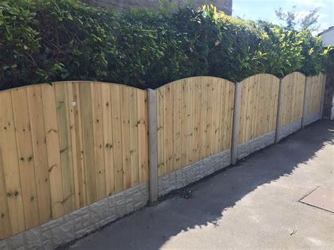 Fencing panels in concrete fence posts with gravel boards | Concrete fence posts, Concrete fence ...