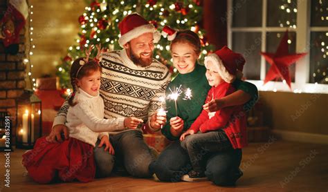 happy family mother, father and children celebrate Christmas and new ...