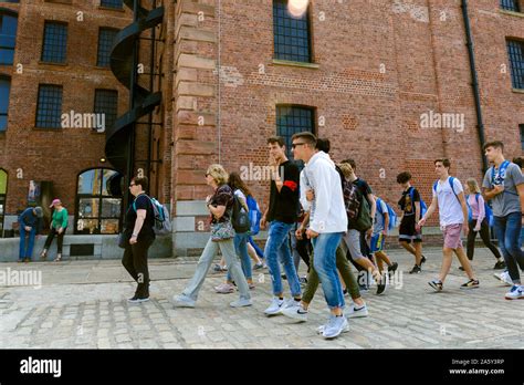 Liverpool and young visitors. Albert docks Stock Photo - Alamy