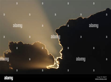 Storm clouds at sunset Stock Photo - Alamy