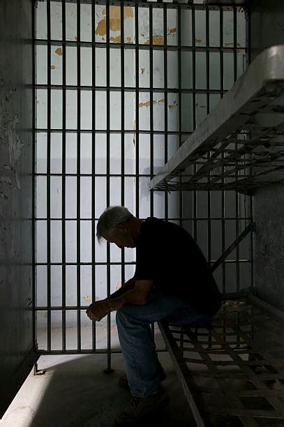 4,200+ Man Prison Cell Stock Photos, Pictures & Royalty-Free Images ...