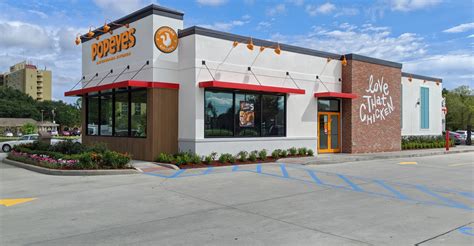 Popeyes unveils updated logo, pilots new domestic design | Nation's Restaurant News