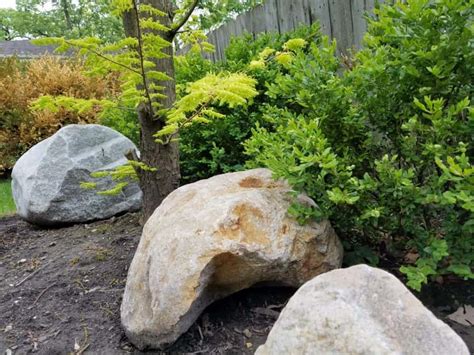 Using Boulders in the Landscape - Sweeney's Custom Landscaping Inc