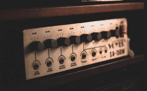 Retro audio equipment on wooden shelf · Free Stock Photo