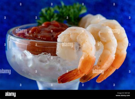 Shrimp cocktail: Side view of the top part of a margarita glass with ...