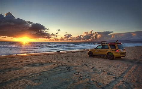 HD wallpaper: beach, sunset, sea, clouds, car | Wallpaper Flare