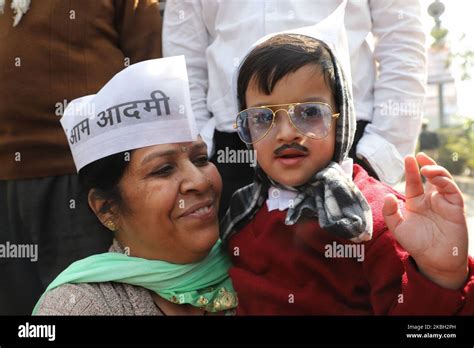 A boy dressed as Delhi Chief Minister Arvind Kejriwal during Swearing-in ceremony at Ramleela ...