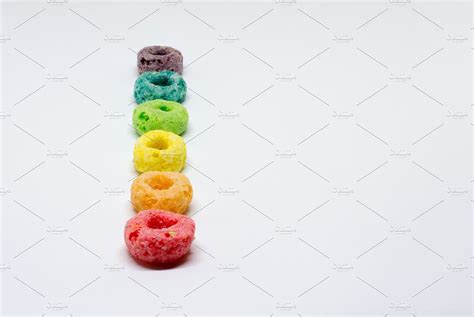 Row of Rainbow Colored Cereal | Food Images ~ Creative Market