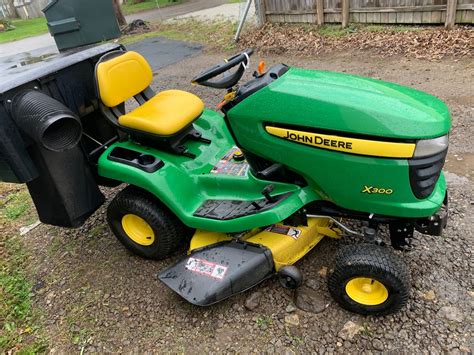 42IN JOHN DEERE X300 LAWN TRACTOR W/BAGGER AND FRONT BLADE! 285 HOURS! - Lawn Mowers for Sale ...