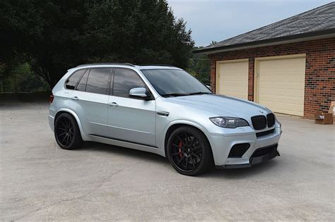 I love the color of this 2011 BMW X5M thats finished in Silverstone Metallic. A popular color on ...