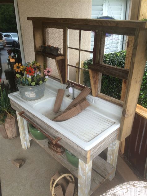 I saw this potting bench at a local antique shop. I must build one. I have two old porcelain ...