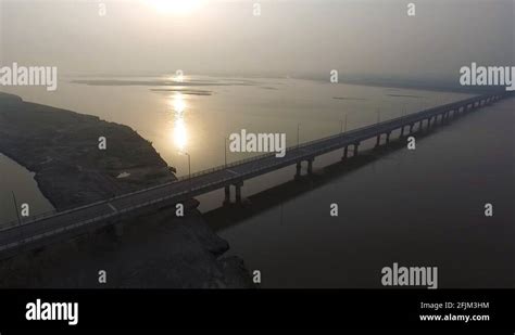 Panning aerial view tracking the new Ravi River Bridge project in ...