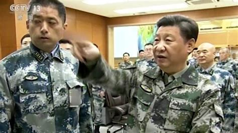 China's Xi Jinping takes commander in chief military title - BBC News