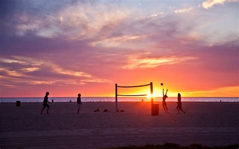 Volleyball on beach, sunset