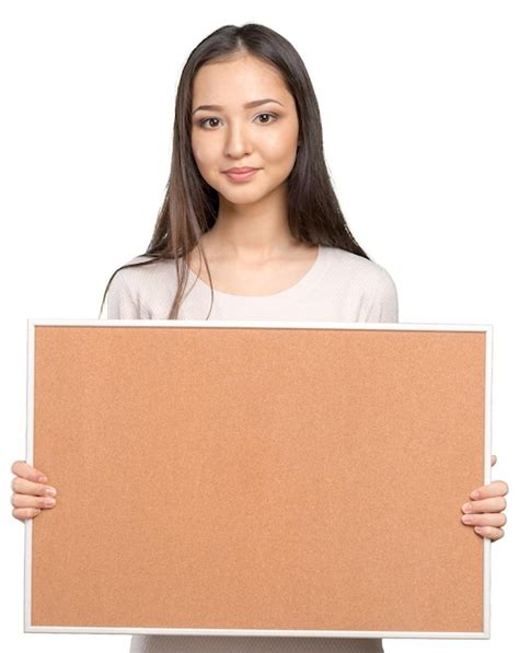 Premium Photo | Young dark hair woman keeping cork board
