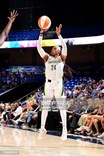 Arike Ogunbowale of the Dallas Wings shoots a three point basket... News Photo - Getty Images