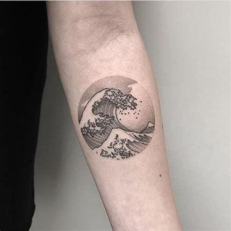 The great wave of Hokusai tattoo on the forearm - Tattoogrid.net