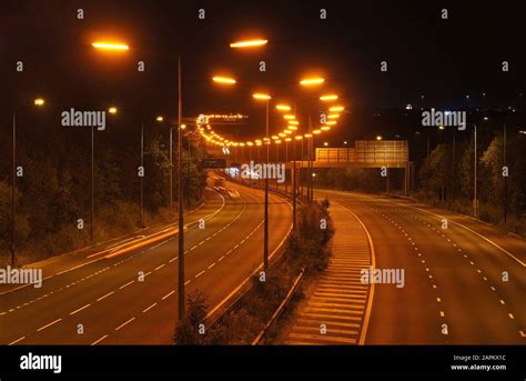 Low Pressure Sodium street lights on an English motorway Stock Photo - Alamy