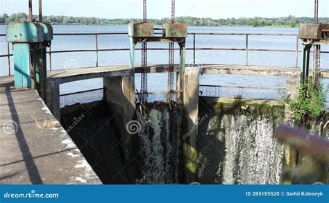 Old dam on the lake stock footage. Video of hydropower - 285185520