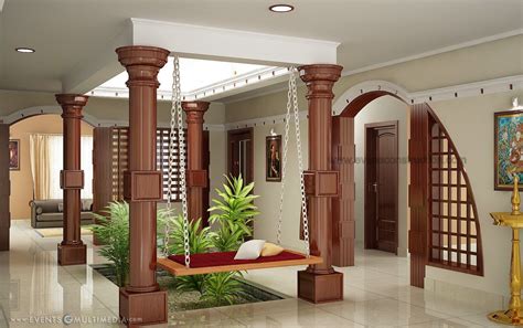 Kerala home with courtyard wooden pillers small courtyard (open roof) near to living area wood ...