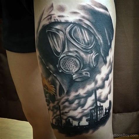 Left Thigh Grey Ink Gas Mask Tattoo | Gas mask tattoo, Tattoos for guys, Tattoo designs men