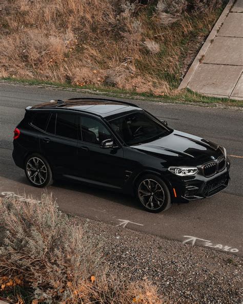 High Angle Shot of a Black BMW X3 on a Street · Free Stock Photo