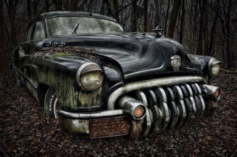 6 Haunting Photographs of Abandoned Vintage Cars Lying in a Forest ...