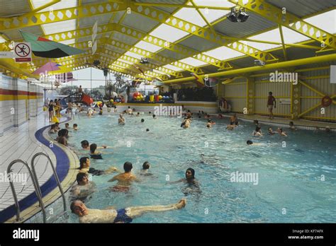 Indoor swimming pool at a Butlins holiday camp. Circa 1980's Stock Photo - Alamy