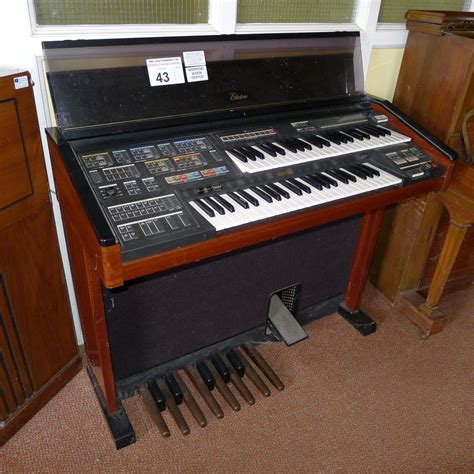 1 YAMAHA Electone MC-600 double keyboard electric organ (located in nursery area)