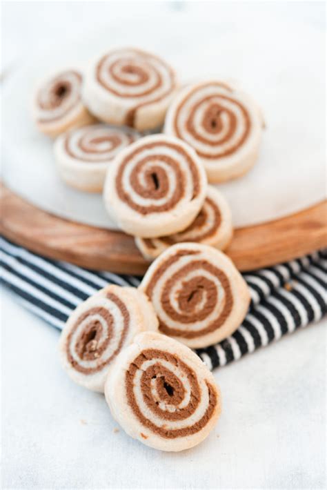 Swirl Orange Cookies to pair with your cup of coffee - Rolled in Dough