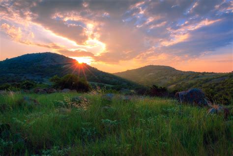 Sunrise over the only mountains in Oklahoma (Witchita Mountains) while out on a trail run. You ...