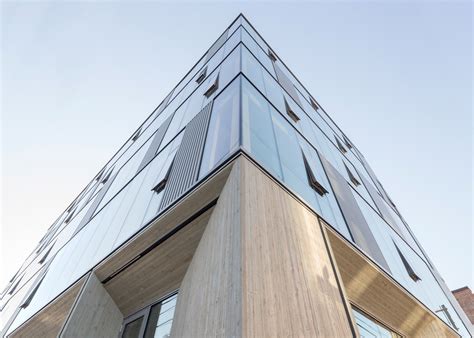 Glass facade reveals timber structure of Portland office building